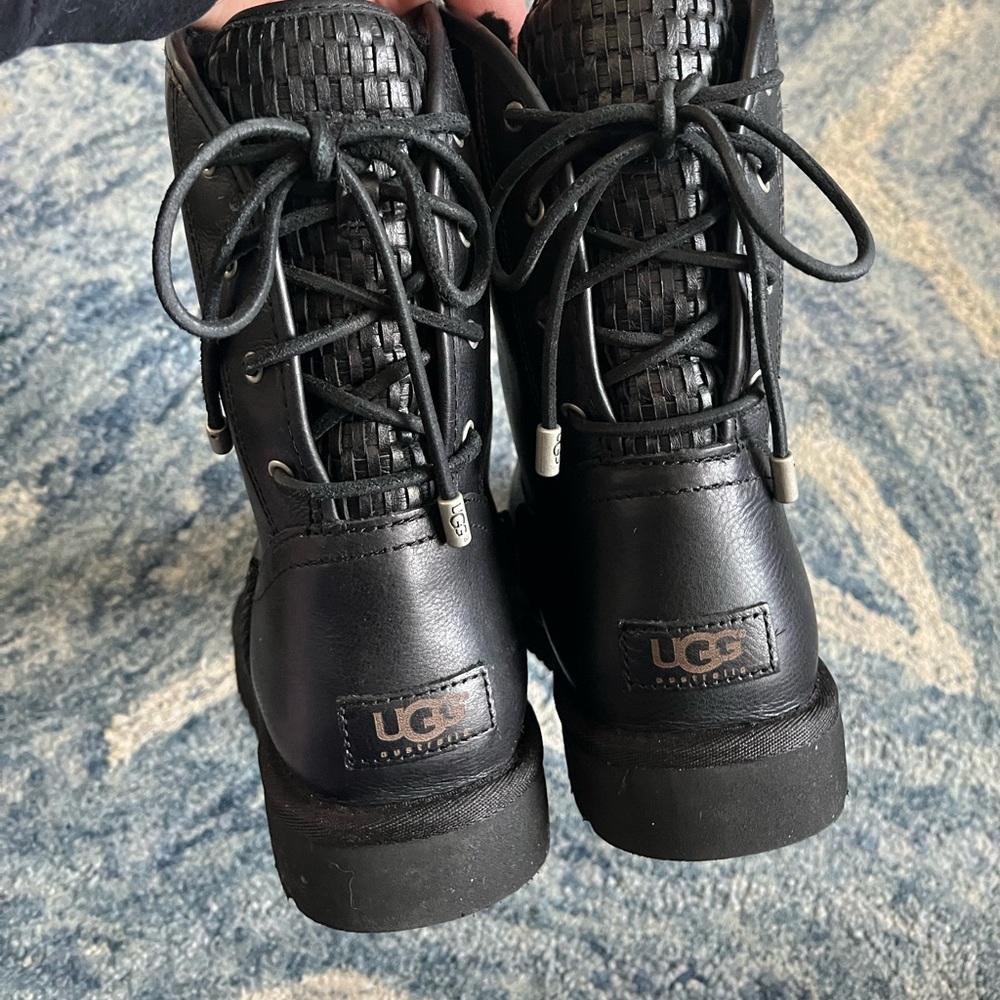 Uggs brand new, leather outside with lace up back, black fur shearling